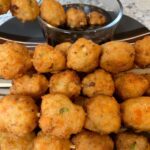 8 Easy Steps to Make the Best Tilapia Fish Ball Recipe at Home Tilapia fish ball recipe photo featuring golden, crispy homemade fish balls served with a savory dipping sauce. A close-up view highlights the texture, vegetables, and perfectly fried finish of this Filipino-style snack.