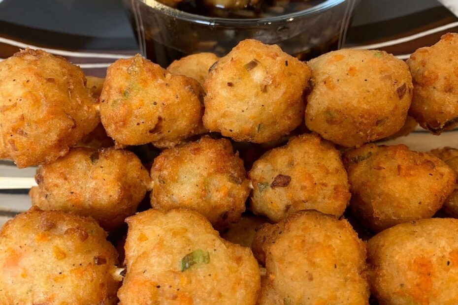 8 Easy Steps to Make the Best Tilapia Fish Ball Recipe at Home Tilapia fish ball recipe photo featuring golden, crispy homemade fish balls served with a savory dipping sauce. A close-up view highlights the texture, vegetables, and perfectly fried finish of this Filipino-style snack.