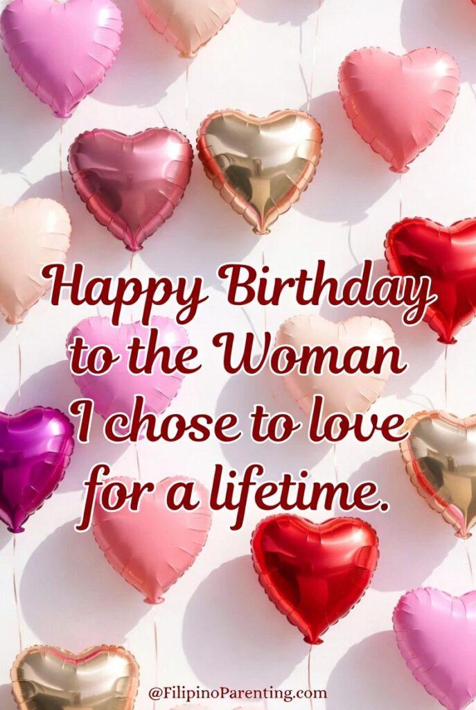 Maligayang Kaarawan Asawang Babae: 25 Heartfelt Birthday Messages, Prayers, and Quotes Celebrate your wife with this vibrant 'Happy Birthday' digital card. Featuring a cheerful background of red, pink, and gold heart-shaped balloons, the message reads: 'Happy Birthday to the Woman I chose to love for a lifetime.' This romantic and high-energy design is perfect for husbands wanting to express lifelong commitment and love on social media platforms like Facebook or Instagram, or as a personalized birthday message.