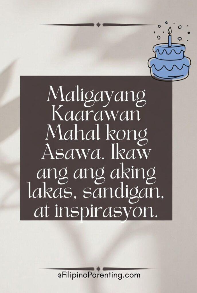Maligayang Kaarawan Asawang Lalaki: 25 Heartfelt Birthday Messages, Prayers, and Quotes A sophisticated and minimalist Tagalog birthday card for a husband or wife. The image features the text, "Maligayang Kaarawan Mahal kong Asawa. Ikaw ang aking lakas, sandigan, at inspirasyon," elegantly displayed on a dark background. Adorned with a charming blue cake icon, this graphic is ideal for expressing deep appreciation and love. Use this high-quality Filipino birthday greeting to celebrate your partner as your source of strength and inspiration on social media or through a private message.