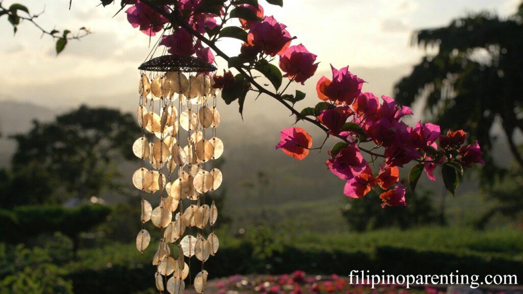 Beautiful Tagalog Expressions Joy Ligaya Happy Heart: 5 Radiant Truths Capiz shell chime in a sunlit garden representing Beautiful Tagalog Expressions Joy Ligaya Happy Heart.