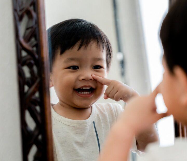 55 Fascinating Body Parts in Tagalog: The Ultimate Guide Child Pointing to Face - Body Parts in Tagalog Practice