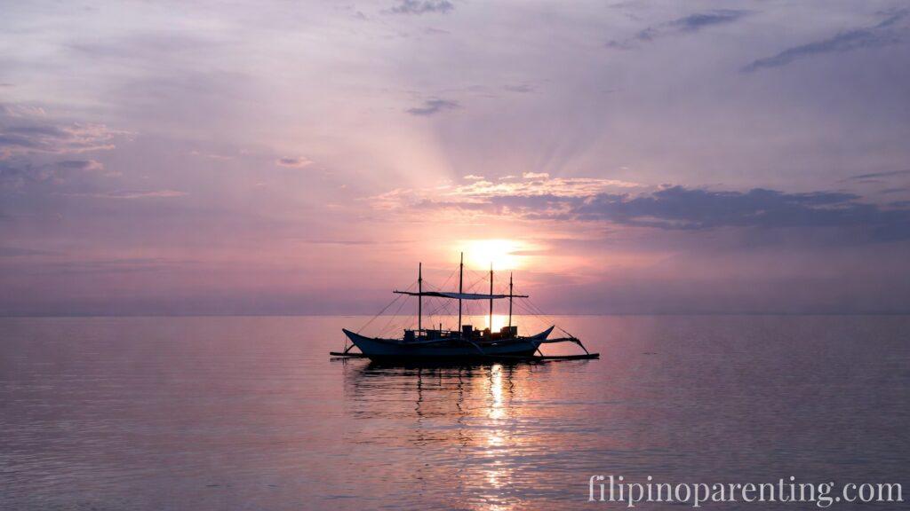 Deep Hugot Tagalog Finding Strength Divine Grace: 5 Unstoppable Truths A Bangka on a calm sea at dawn representing Deep Hugot Tagalog Finding Strength Divine Grace.