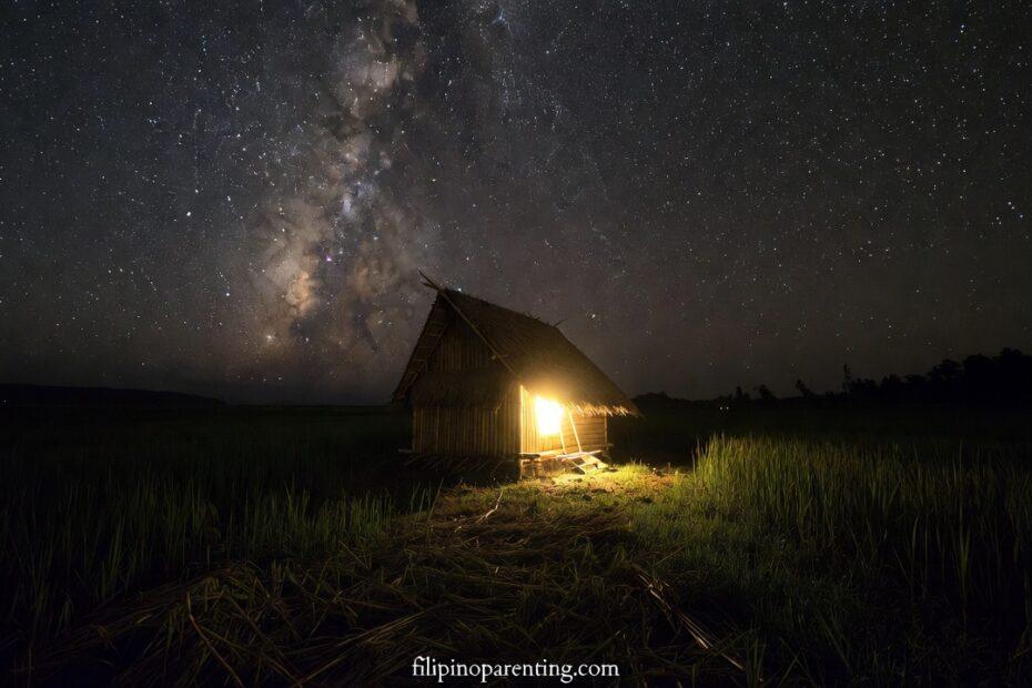 A Bahay Kubo under a starry sky representing Deep Tagalog Lines Nighttime Thoughts Reflection.