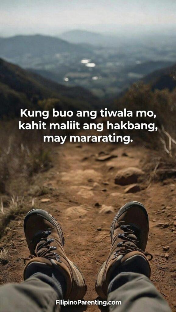 Inspirational Tagalog Quotes for Inner Strength: 5 Unstoppable Lines of Faith A vertical POV shot of a person’s feet in hiking boots standing on a rugged trail overlooking a valley.