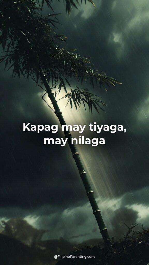 Pinoy Motivational Quotes: 30 Powerful Sayings to Build Your Inner Strength A resilient bamboo stalk under a stormy sky with rays of light, featuring Pinoy Motivational Quotes: “Kapag may tiyaga, may nilaga,” inspiring patience, perseverance, and Filipino inner strength.