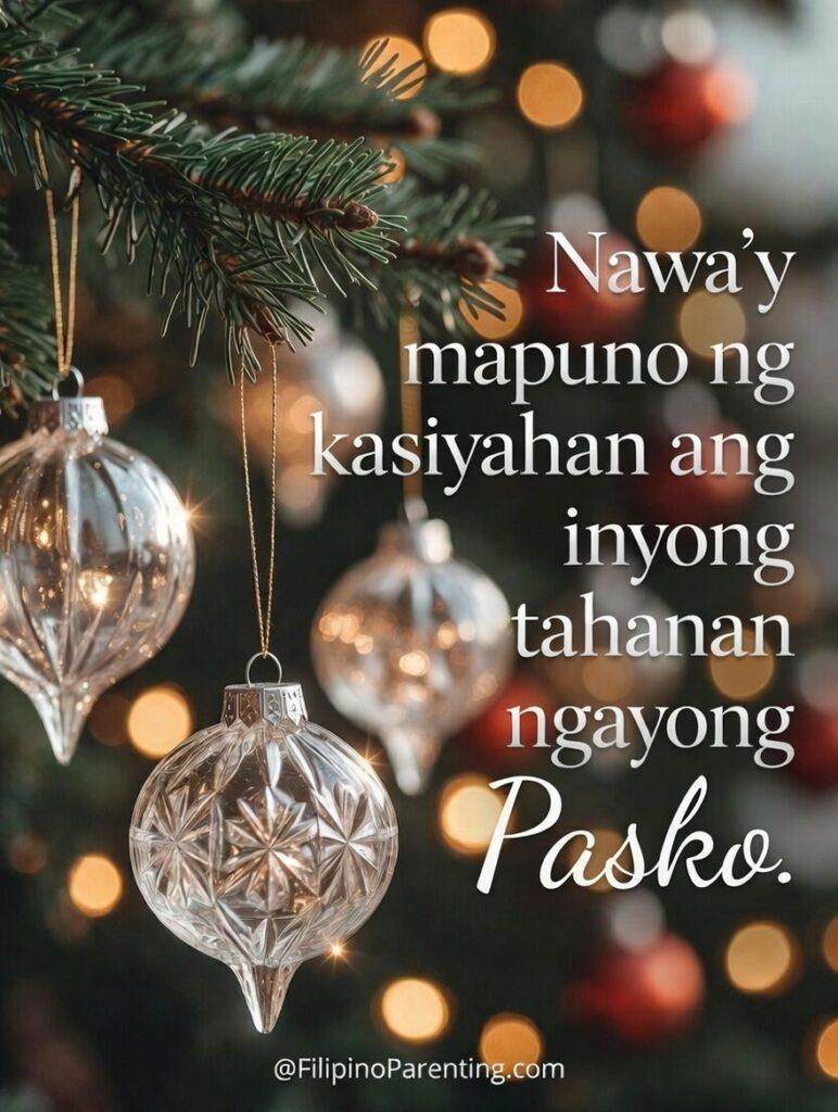 Maligayang Pasko Greetings: 50 Heartfelt Tagalog Ways to Say Merry Christmas Close-up of elegant glass Christmas ornaments on a pine tree for Maligayang Pasko greetings and traditional Filipino holiday home decor.