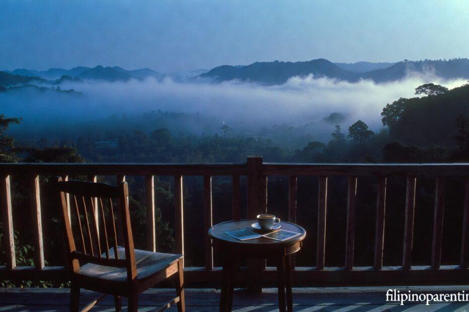 An empty chair on a balcony at dawn representing Tagalog Quotes Longing Absence Missing Someone.