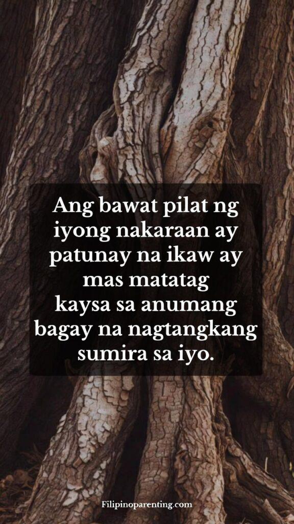 Tagalog Quotes for Inner Resilience and Strength: 5 Unshakeable Truths A close-up of a person's weathered hands or a sturdy tree trunk with deep bark patterns, looking resilient and strong.