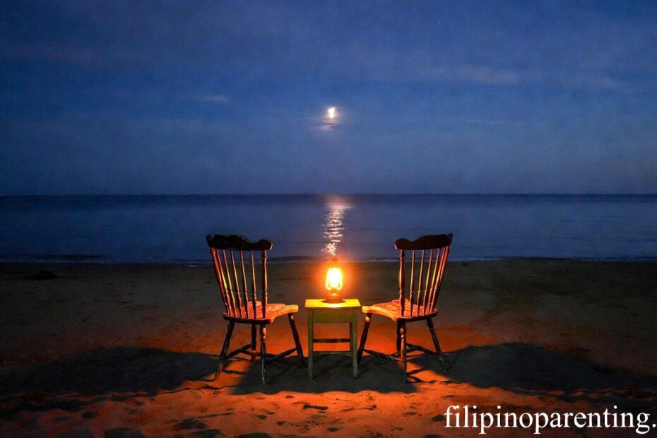 Two chairs at twilight representing Tagalog quotes about silent love.